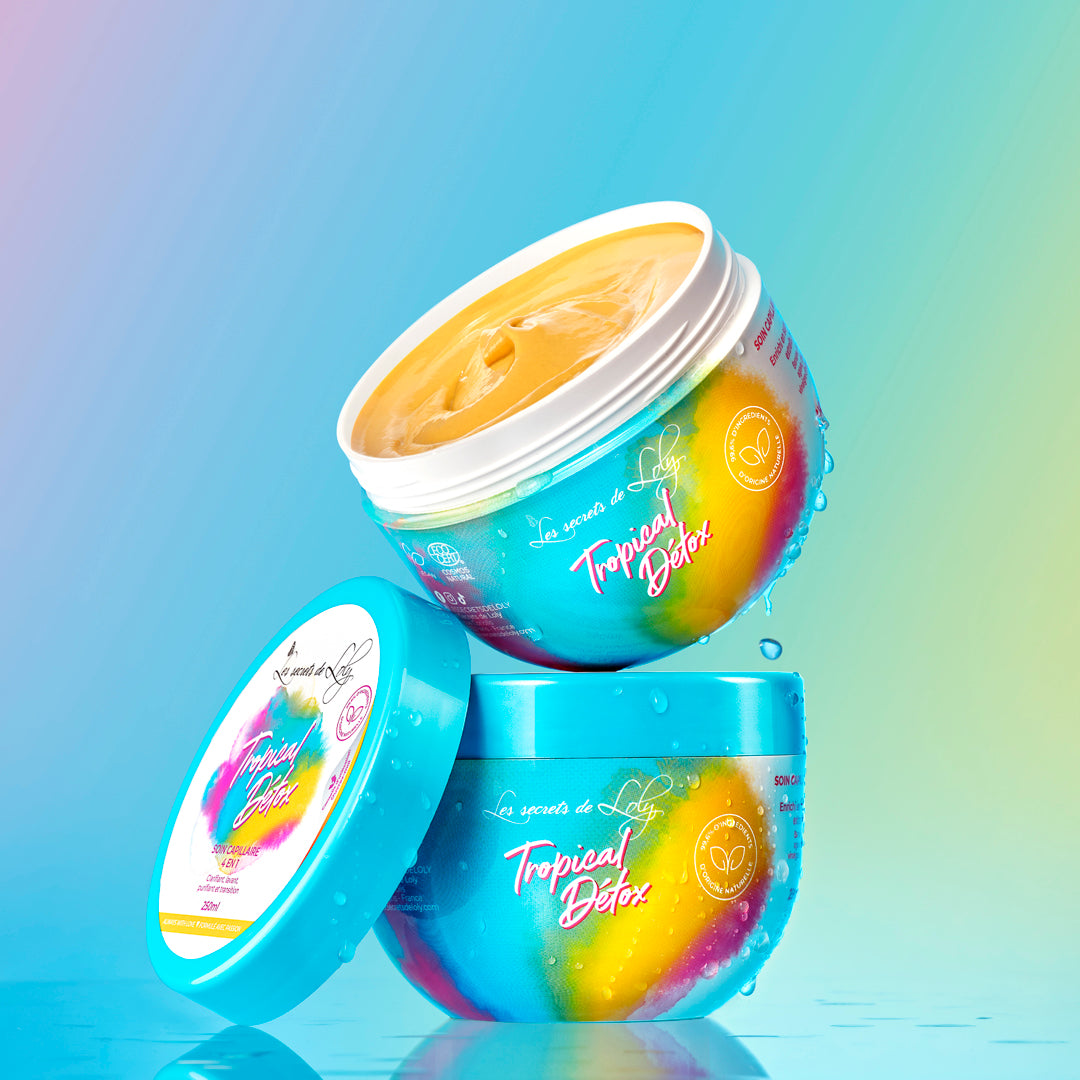 Colorful Tropical Detox hair mask containers for natural hair care, with open jar showing creamy texture.