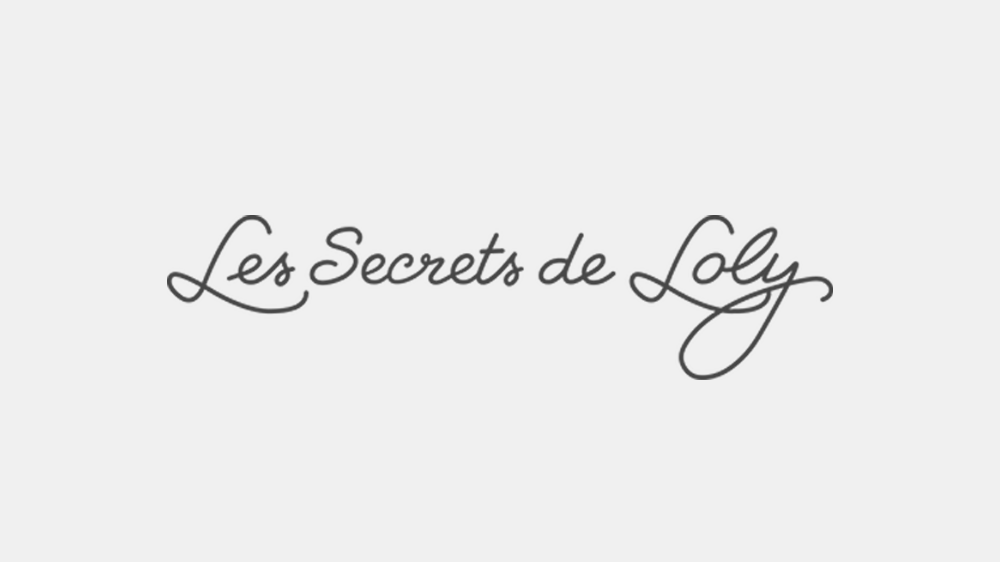 Les Secrets de Loly logo in elegant script on a white background