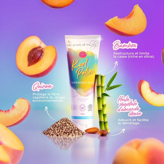 Curl Potion Superfood Milk hair product with bamboo, quinoa, almond, and peach slices on a colorful background