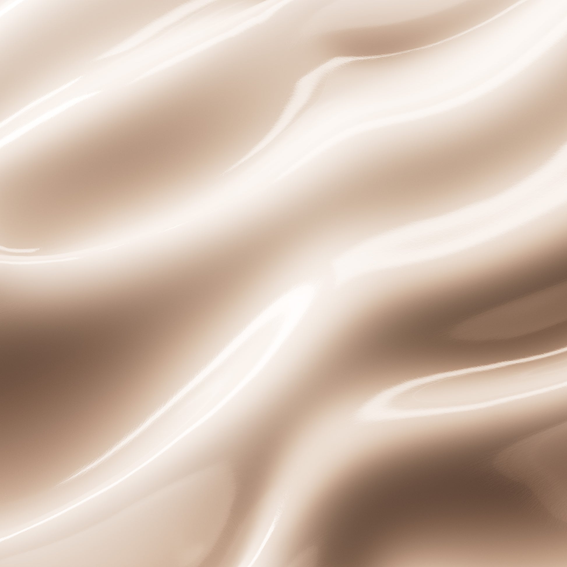 Smooth, creamy beige hair care product texture with natural shine, close-up