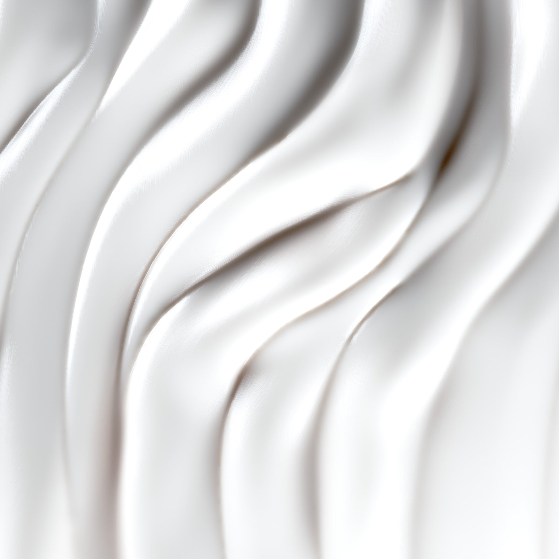 Smooth white creamy hair care product texture with wavy patterns