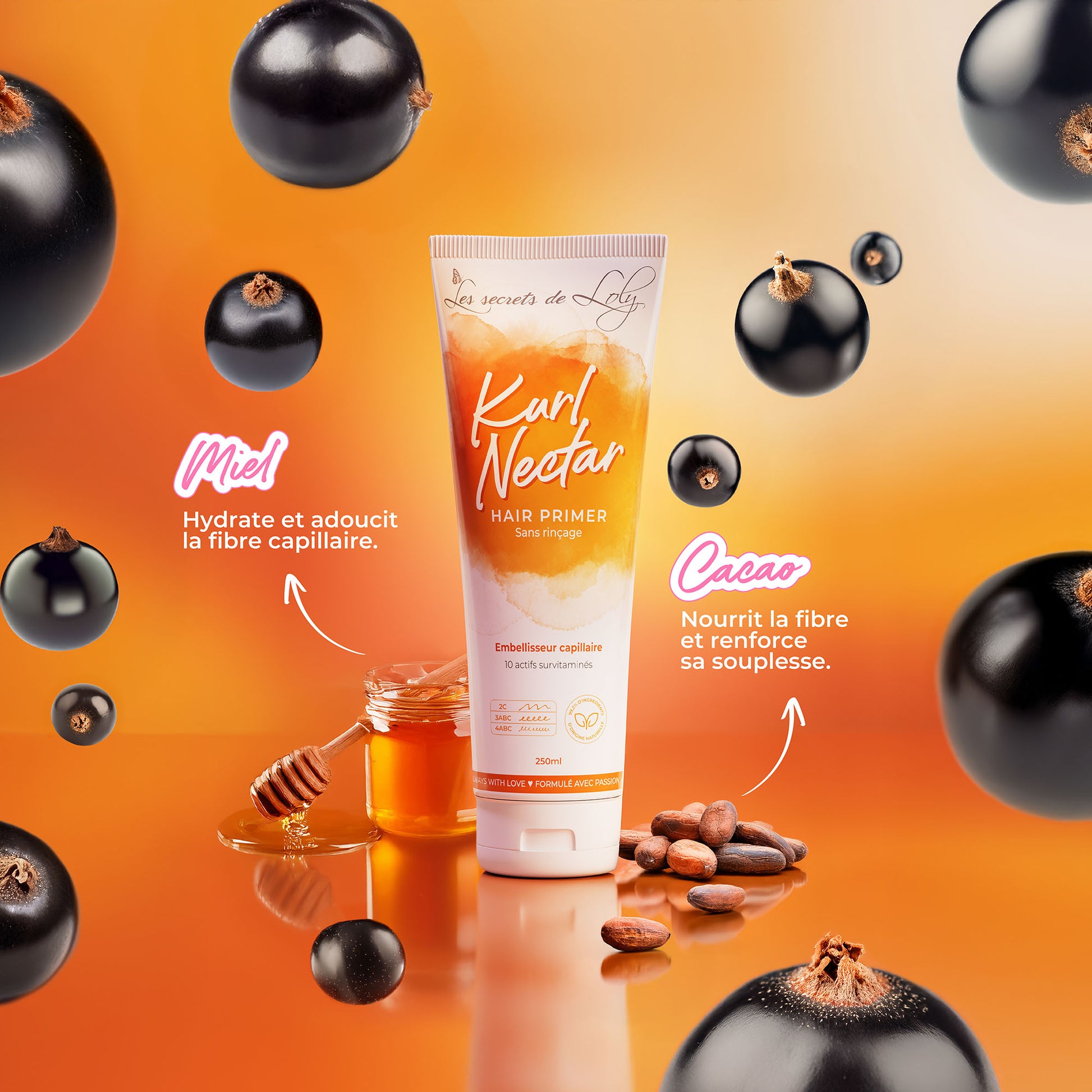 Kurl Nectar hair primer tube with honey, blackcurrants, and cacao on orange background