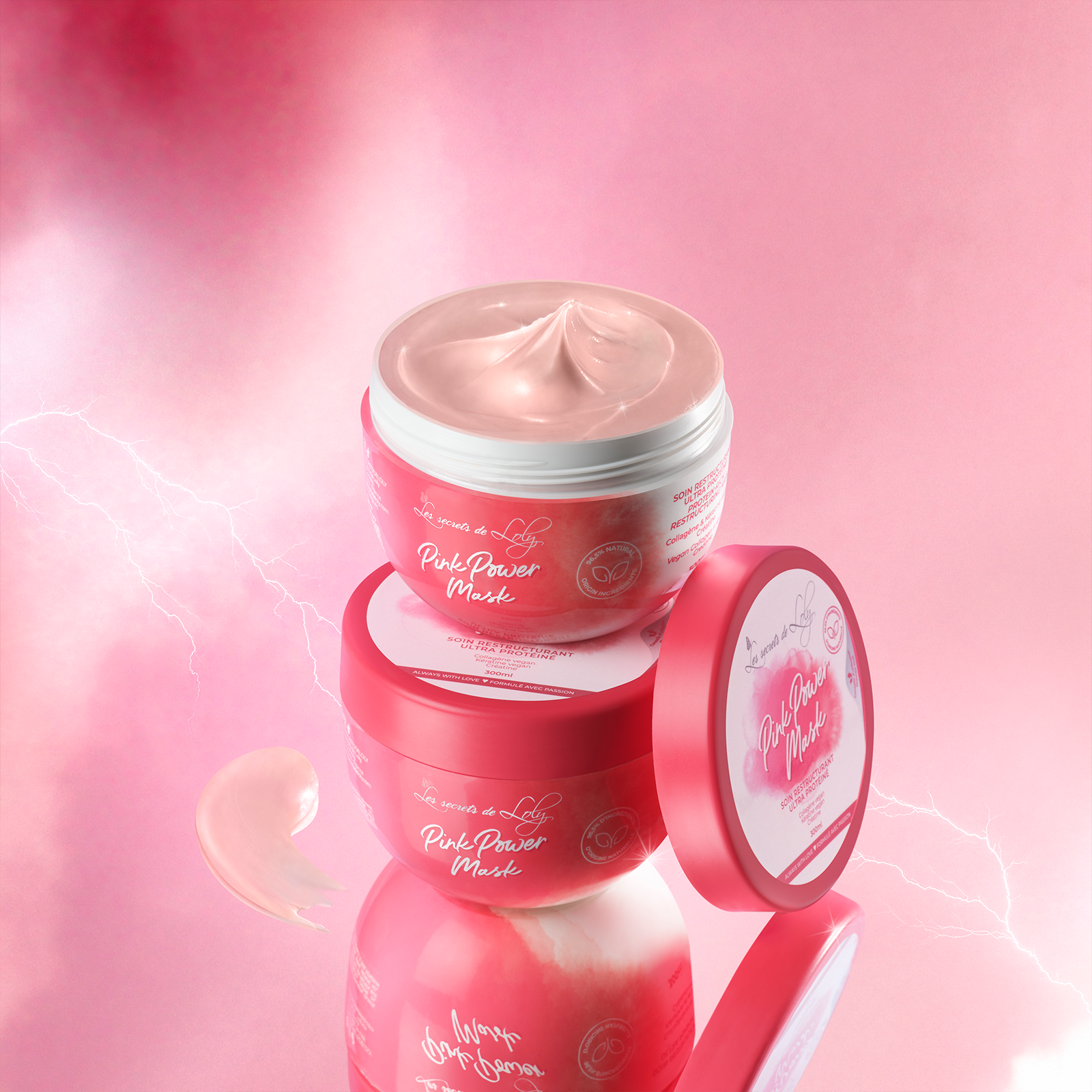 Pink hair mask jar with creamy texture on a pink gradient background, natural hair care